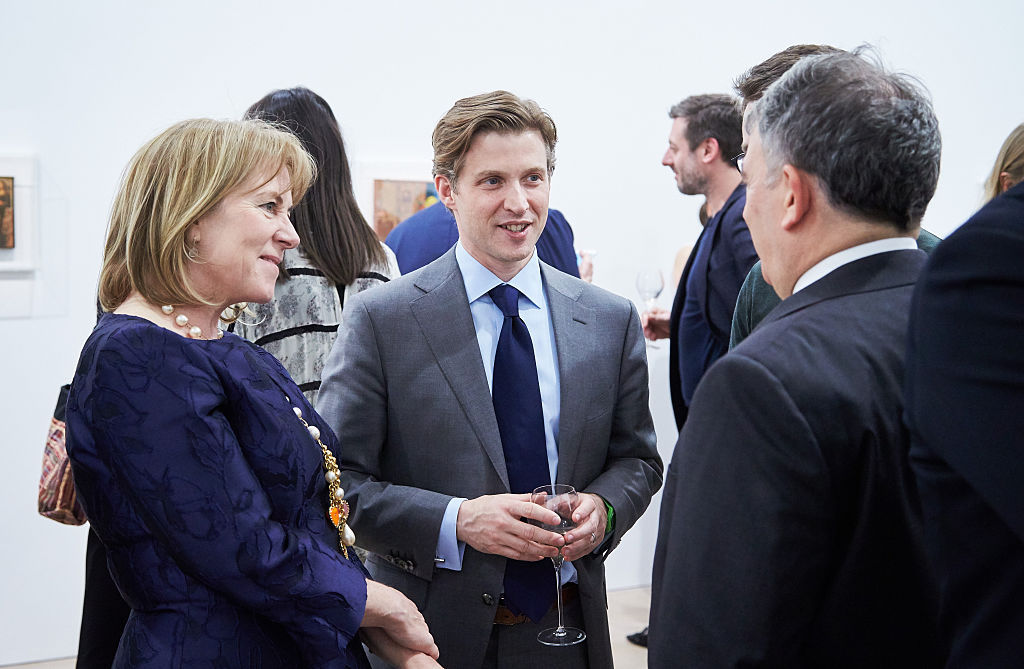 LONDON, ENGLAND - FEBRUARY 24:  (L-R) Hannah Rothschild,  Alec Ross and guest at the book launch of "Industries of the Future" by Alec Ross, hosted by Maria Baibakova at David Zwirner at David Zwirner on February 24, 2016 in London, England.  (Photo by Michael Bowles/Getty Images for Maria Baibakova)