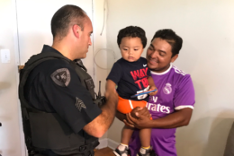 Sgt. Nick Cicale visits with Carlos Sr. (WTOP/Michelle Basch)