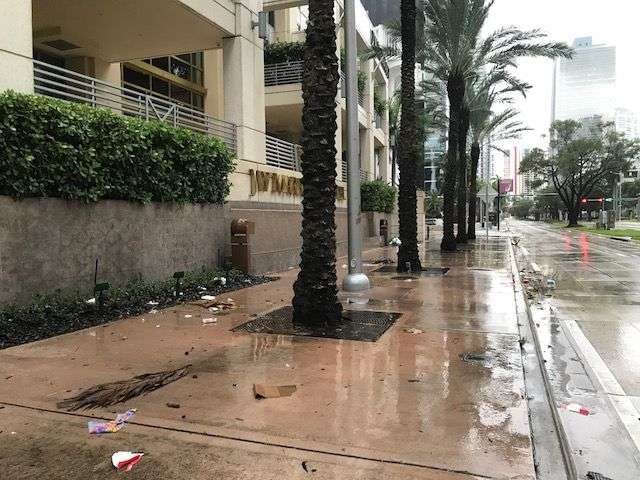 Debris has begun to litter the streets of downtown Miami as gusting winds signal the arrival of Irma. (WTOP/Steve Dresner)
