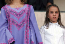 Daughters of Jordan's King Abdullah, Princess Eman, left, and Princess Salma attend a celebration of the 10th anniversary of the King's accession to the Throne at Amman International Stadium on Tuesday June 9, 2009. Hundreds of thousands of people lined the streets to greet King Abdullah and Queen Rania as their motorcade passed through the capital's streets to the site of the ceremony. (AP Photo/Mohammad Abu Ghosh)