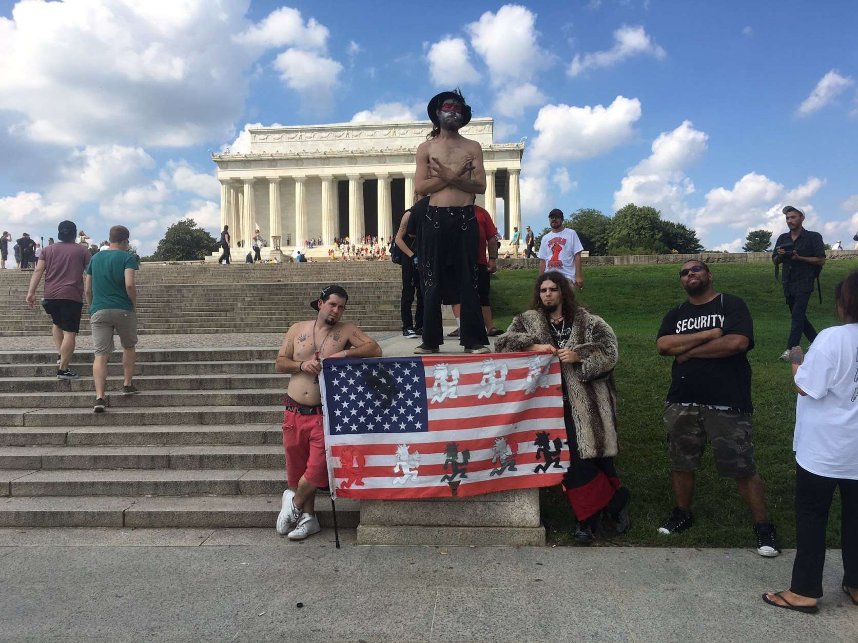 <p>Fans of a the band Insane Clown Posse gather at Lincoln Memorial Sept. 16, 2017, for rally and march against the FBI's classification of them as a gang. (WTOP/Mike Murillo)</p>