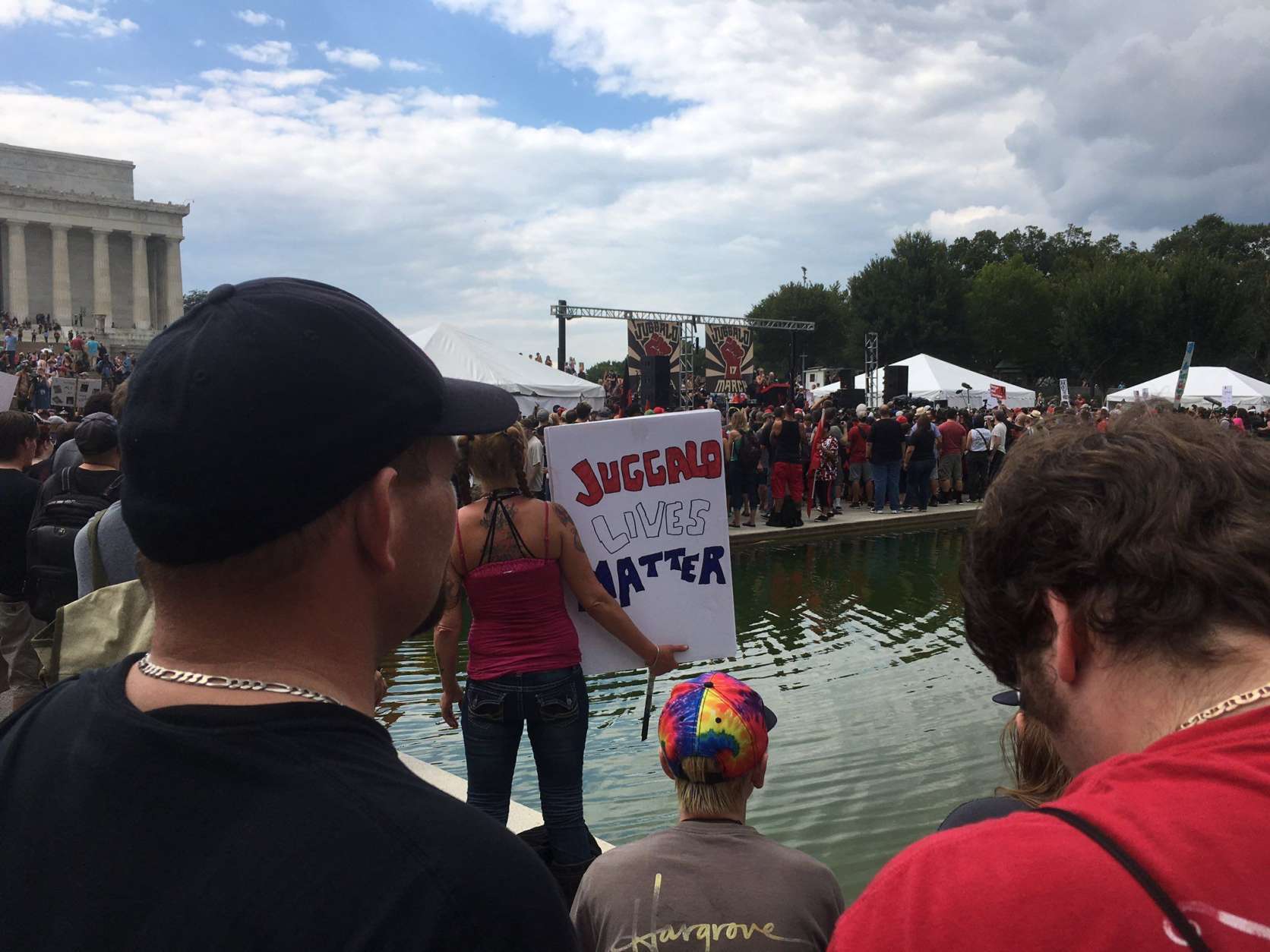 The crowd grows along the reflecting pool for the Juggalo March Sept. 16, 2017. (WTOP/Mike Murillo)