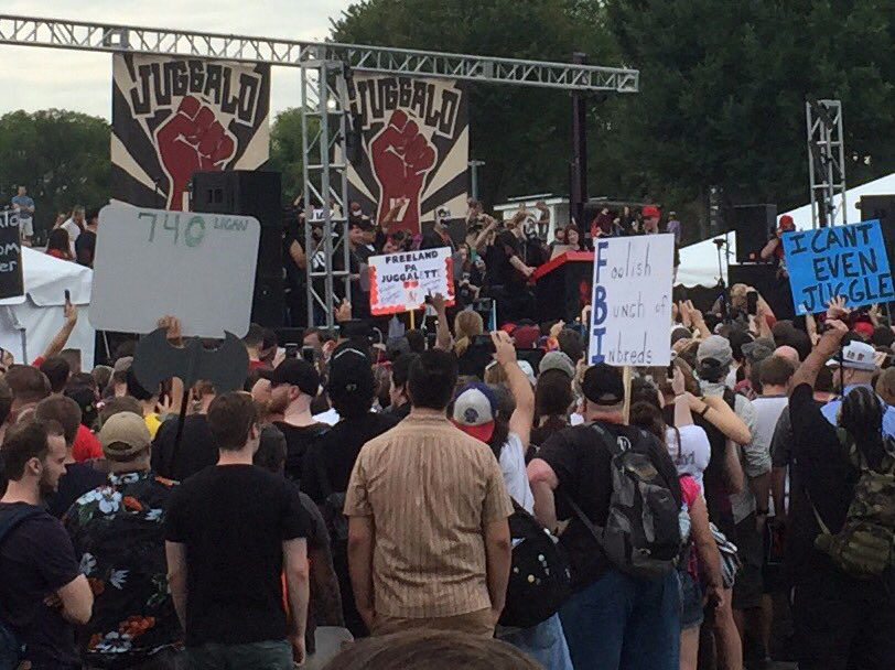 Members of Insane Clown Posse address crowd gathered at the Lincoln Memorial ahead of the Juggalo March Sept. 16, 2017. (WTOP/Mike Murillo)