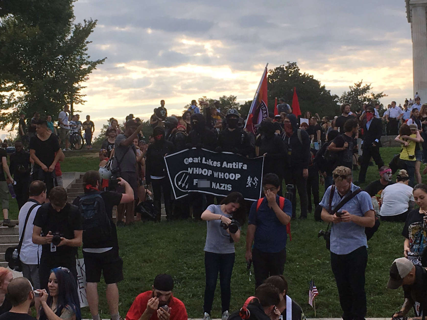 Members of an AntiFa  group (toting a profanity-laced flag that WTOP has censored) gathered on the Lincoln Memorial for  the Juggalo March Sept. 16, 2017. (WTOP/Mike Murillo)