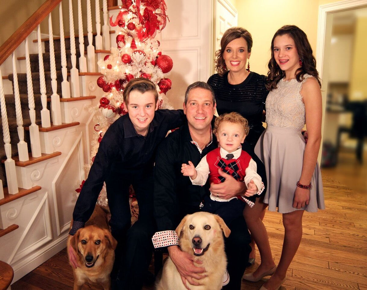 Rep. Tim Ryan, D-Ohio, and family posing with the family dogs, Buckeye and Bear. (Courtesy Humane Rescue Alliance)