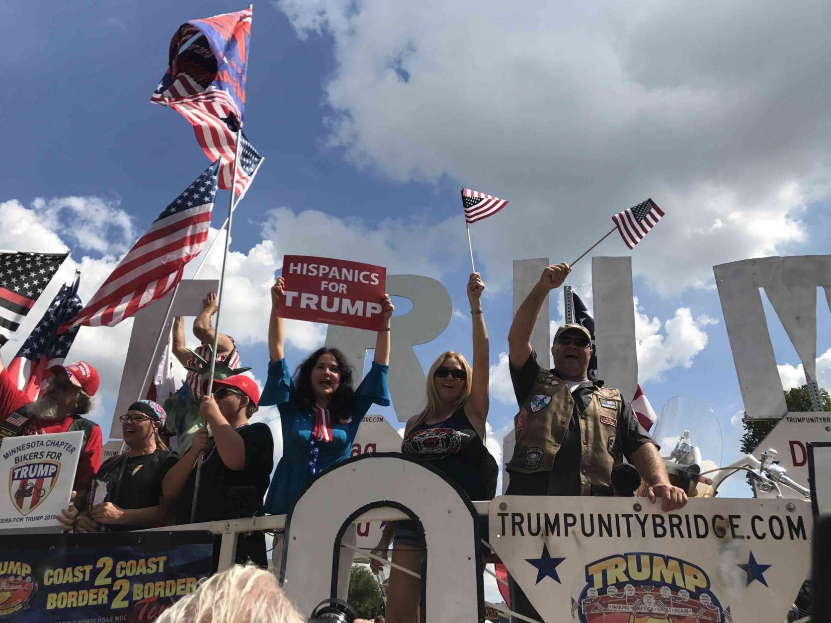 The rally included a float driven to the center of the National Mall, festooned with patriotic symbols, bearing “Trump” in giant, capital letters. (WTOP/Dick Uliano) 