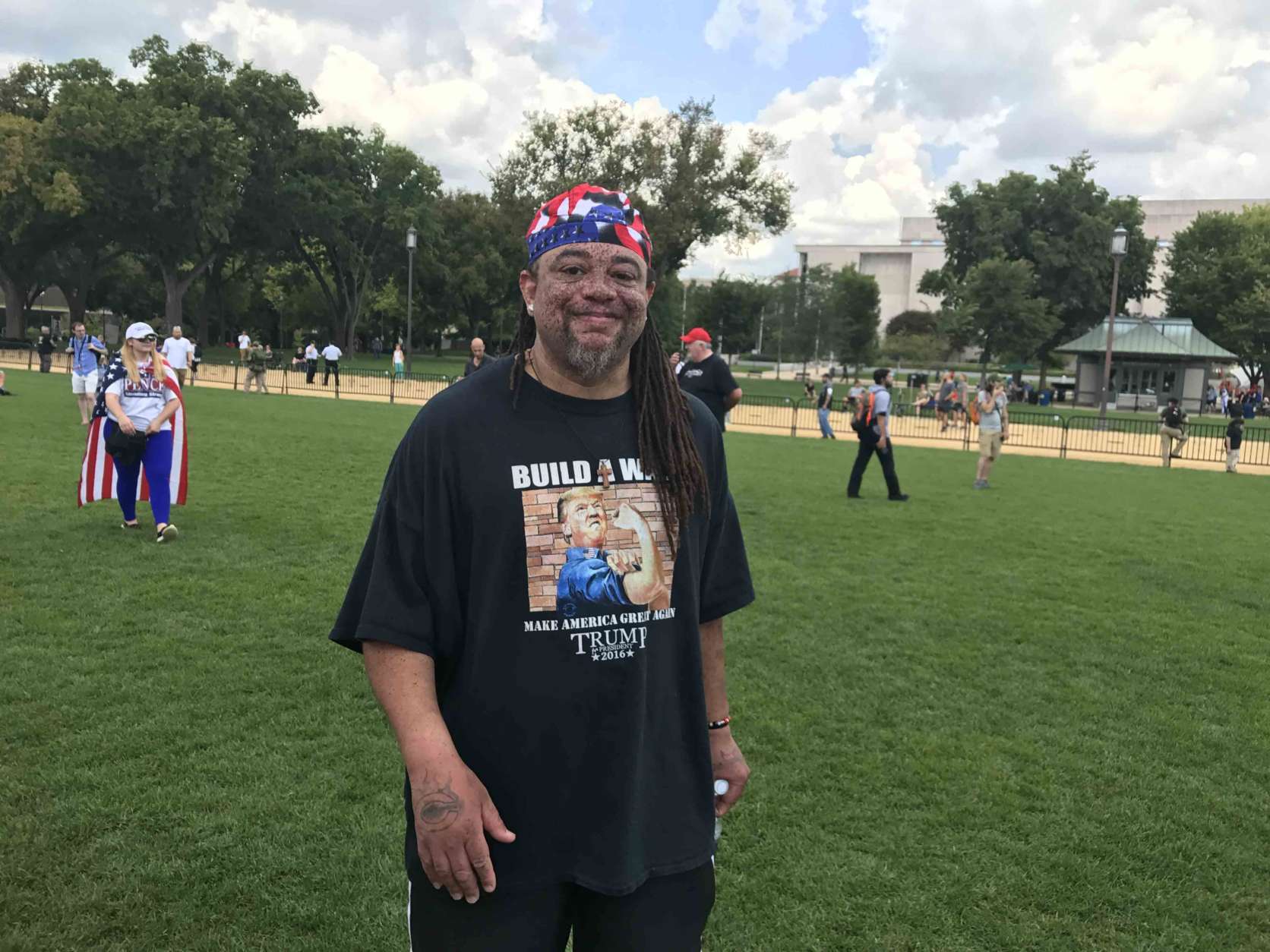 "Trump is for the people," said Moe Delk, who said he is a former gang member from Chicago who now lives and works in Milwaukee. "We're just people who love America. We're about America first.” (WTOP/Dick Uliano) 