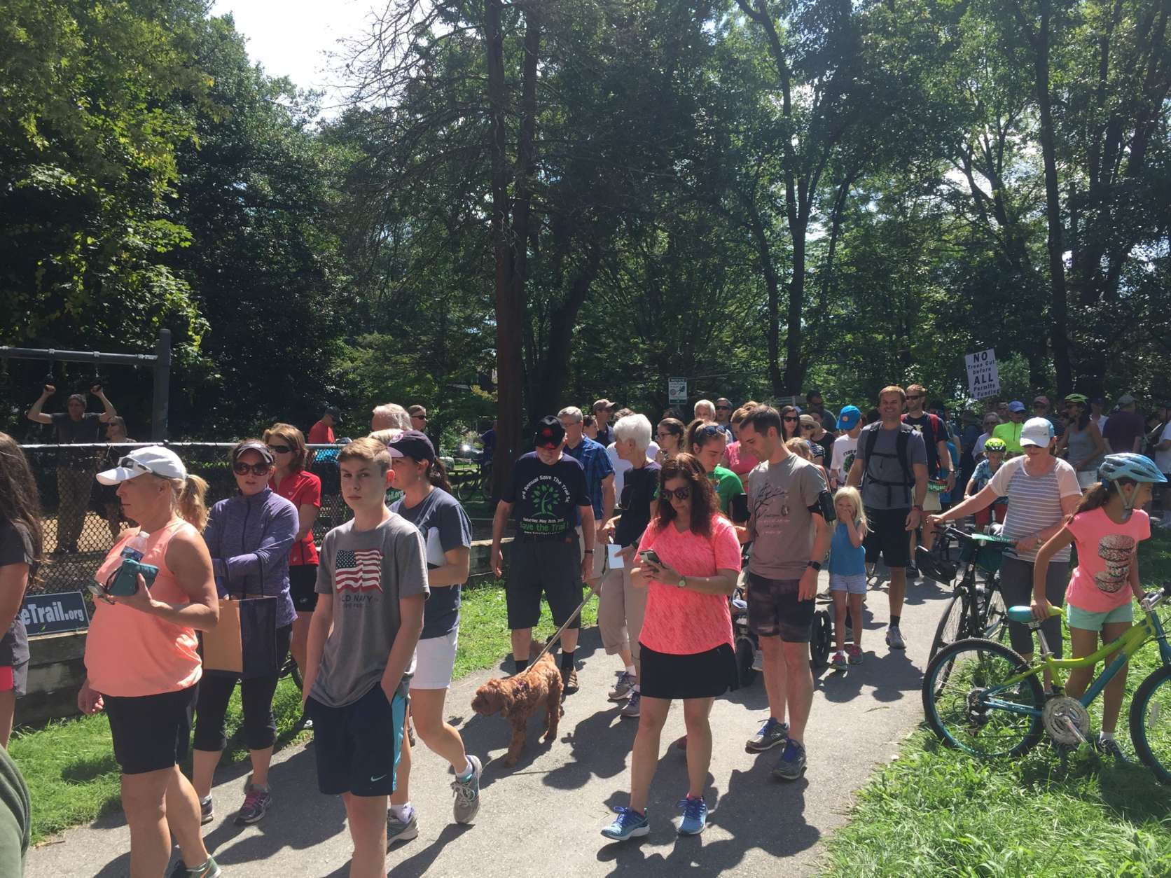 People who oppose the closing of the Georgetown Branch Trail due to the Purple Line construction gather for a final walk Monday, Sept. 4, 2017. (WTOP/Mike Murillo)
