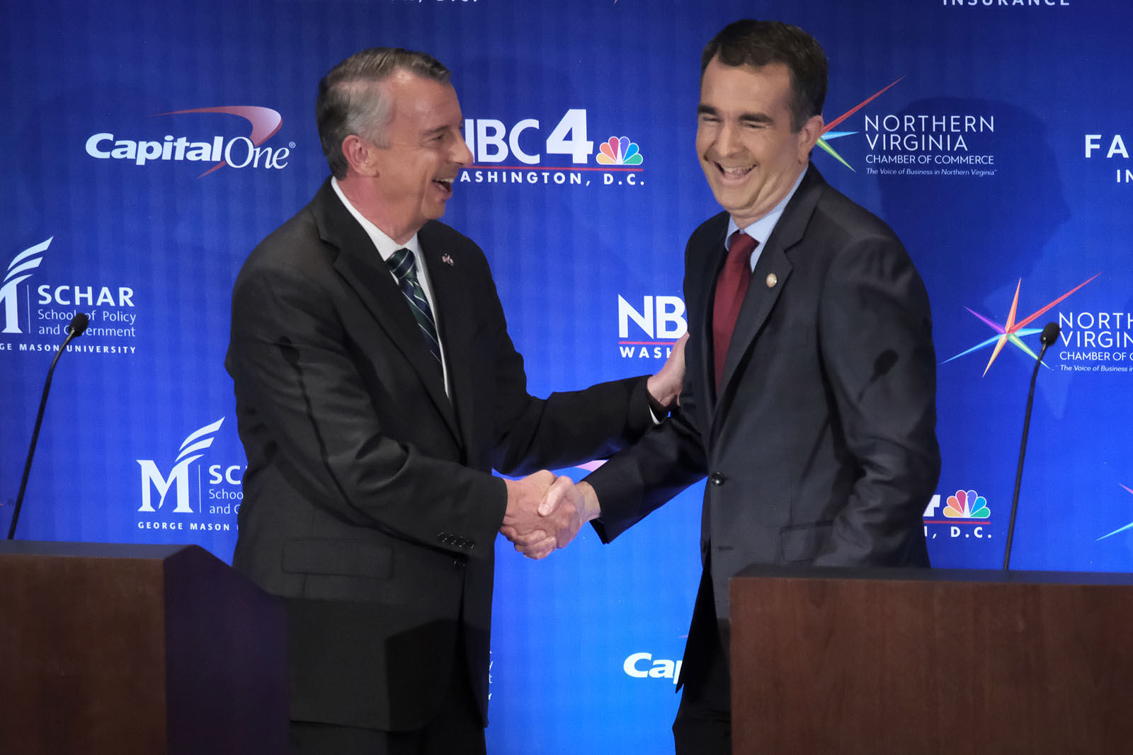 WASHINGTON , DC - SEPTEMBER 19: Gubernatorial candidates Ed Gillespie and Lt. Gov. Ralph Northam shake hands at the end of their debate in Washington, DC on September 19, 2017. (Pool Photo by Bonnie Jo Mount/The Washington Post)