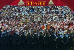 A line of Marines hold 27,822 runners at the starting line of the 30th Marine Corps Marathon on Sunday, Oct. 30, 2005, in Arlington, Va. (AP Photo/Kevin Wolf)