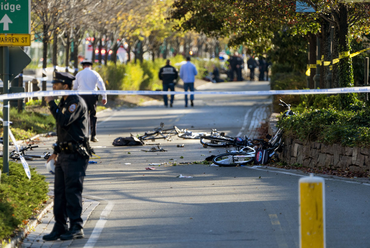 Bicycles and debris lay on a bike path after a motorist drove onto the path near the World Trade Center memorial, striking and killing several people Tuesday, Oct. 31, 2017.  (AP Photo/Craig Ruttle)