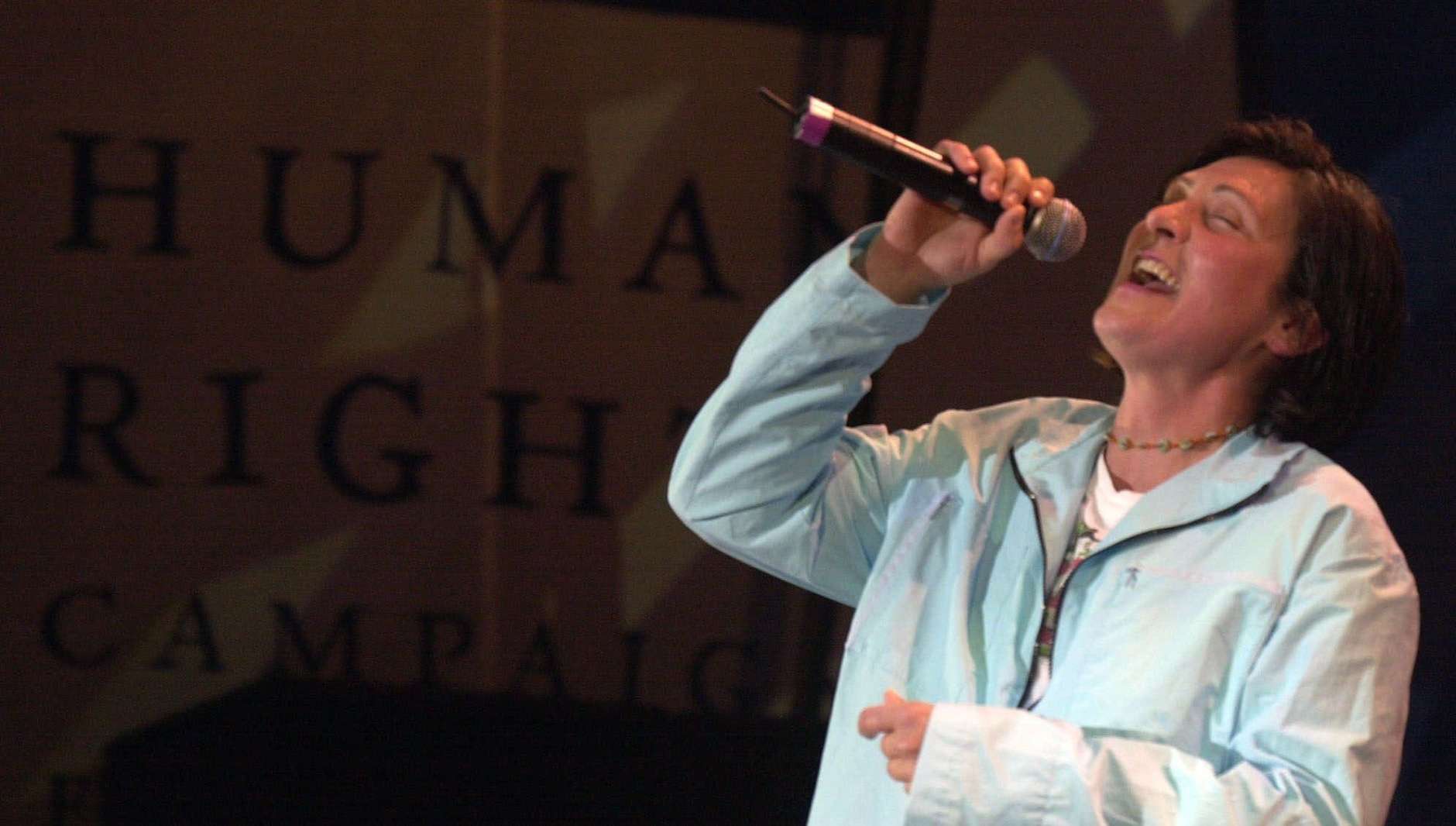 k.d. lang sings at the "Equality Rocks" concert at the RFK Stadium in Washington, Saturday April 29, 2000. The concert was held to raise awareness for the Human Rights Campaign, a gay rights organization that is co-sponsoring Sunday's Millennium March on the National Mall. (AP Photo/Linda Spillers)