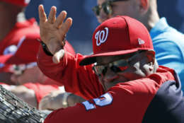 Washington Nationals manager Dusty Baker waves during practice at Nationals Park, Tuesday, Oct. 3, 2017, in Washington. Game 1 of the National League Division Series against the Chicago Cubs is Friday. (AP Photo/Alex Brandon)