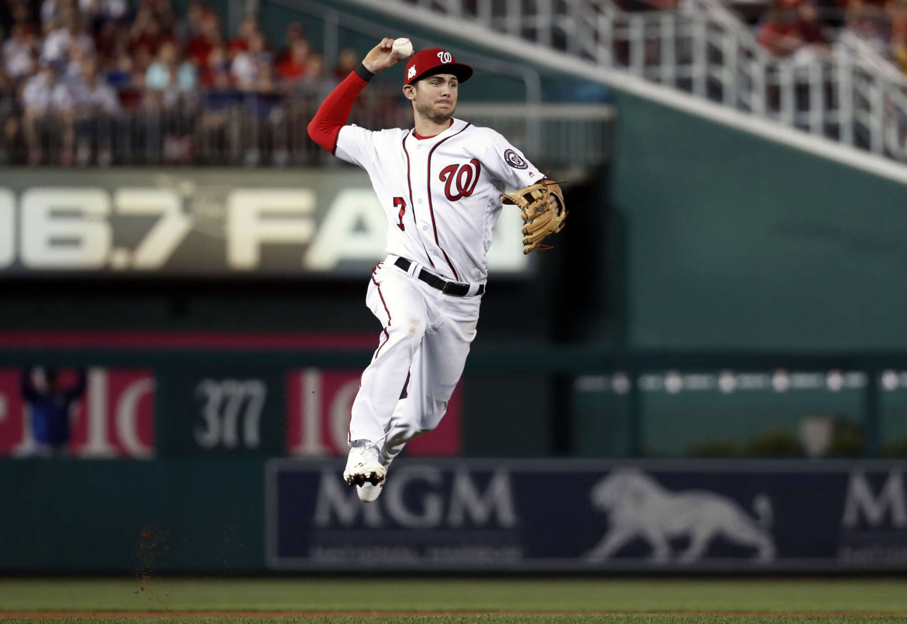 Washington Nationals shortstop Trea Turner (7) throws out Chicago Cubs' Willson Contreras (40) during the sixth inning of Game 1 of baseball's National League Division Series, at Nationals Park, Friday, Oct. 6, 2017, in Washington. The Cubs won 3-0. (AP Photo/Alex Brandon)