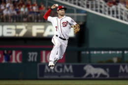 Washington Nationals shortstop Trea Turner (7) throws out Chicago Cubs' Willson Contreras (40) during the sixth inning of Game 1 of baseball's National League Division Series, at Nationals Park, Friday, Oct. 6, 2017, in Washington. The Cubs won 3-0. (AP Photo/Alex Brandon)