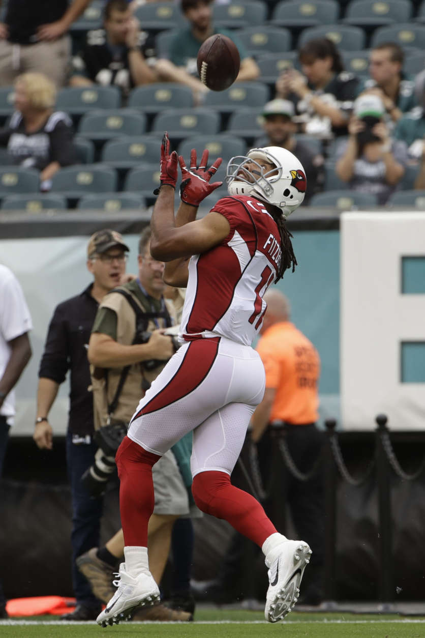 Arizona Cardinals' Larry Fitzgerald warms up before an NFL football game against the Philadelphia Eagles, Sunday, Oct. 8, 2017, in Philadelphia. (AP Photo/Matt Rourke)