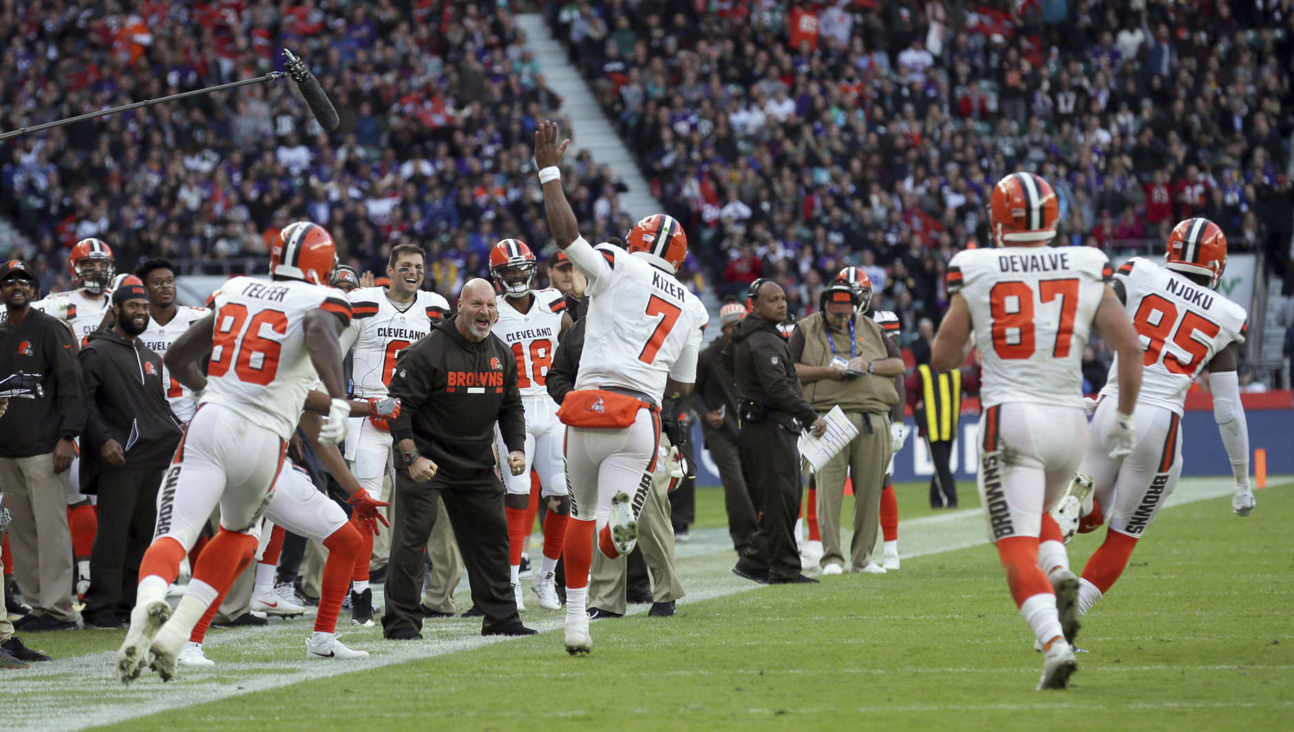 Cleveland Browns quarterback DeShone Kizer (7) celebrates with teammates after scoring on a 1-yard touchdown run during the first half of an NFL football game against the Minnesota Vikings at Twickenham Stadium in London, Sunday Oct. 29, 2017. (AP Photo/Tim Ireland)