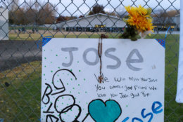 Students return to Sparks Middle School on Monday morning, Oct. 28, 2013, for the first time since Oct. 21, when a 12-year-old student gunned down a teacher and wounded two classmates before killing himself. Friends added a rememberence of the shooter, Jose Reyes, at a makeshift memorial also honoring the fallen math teacher and ex-Marine Michael Landsberry. Police don't know why seventh grader Jose Reyes killed 45-year-old Michael Landsberry and shot two 12-year-old boys before turning the handgun on himself. AP Photo/Scott Sonner)