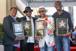 Robert "Kool" Bell, from left, Ronald Khalis Bell, Dennis "DT" Thomas and George Brown attend a ceremony honoring Kool and The Gang with a star on The Hollywood Walk of Fame on Thursday, Oct. 8, 2015, in Los Angeles. (Photo by Rich Fury/Invision/AP)
