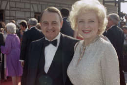 Actor John Hillerman died Thursday, Nov. 9, 2017. He started as Higgins in "Magnum, P.I." He is pictured here with actress Betty White at the Emmy Awards, Sept. 22, 1985 in Pasadena, California. (AP Photo/LIU)