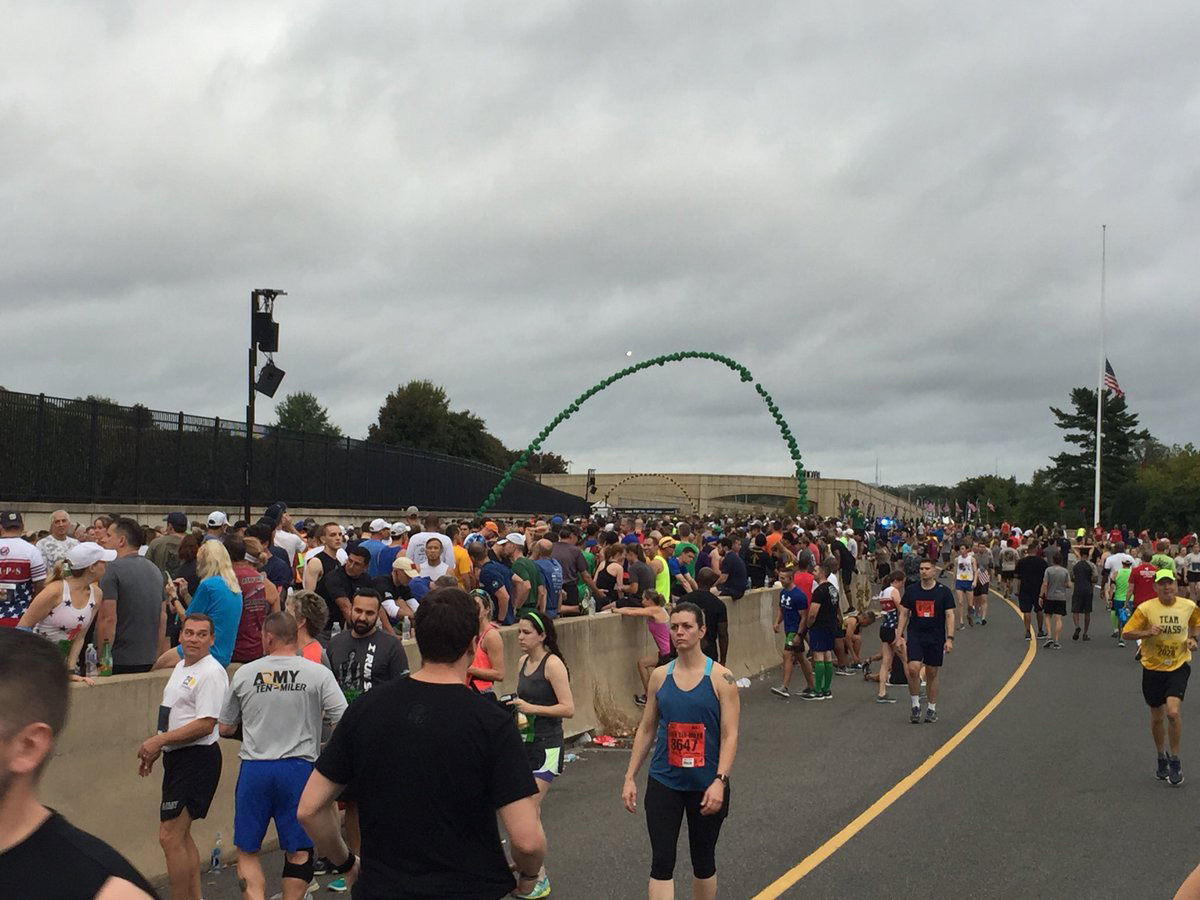 The first of 35,000 runners gather near the starting line for the start of the Army 10 Miler. (WTOP/John Domen)