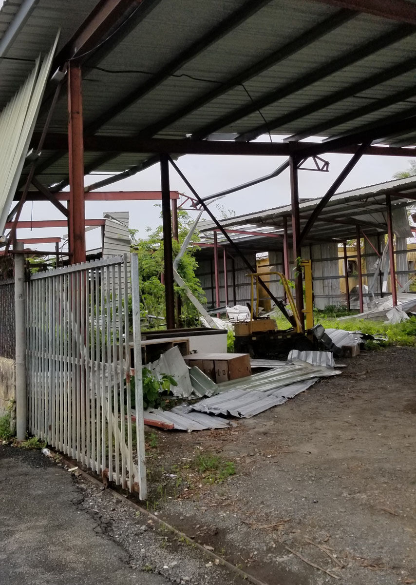 The destruction is apparent at this warehouse in Bayamón, about 12 miles south of San Juan, Puerto Rico. (WTOP/Albert Shimabukuro)