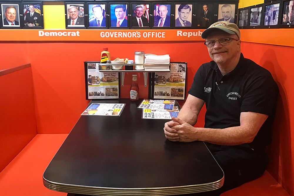 Ted Levitt poses for a photo on the morning of Tuesday, Sept. 19, 2017, in the acclaimed governor’s booth inside Chick & Ruth’s Delly in Annapolis, Maryland. (Jess Feldman/Capital News Service)