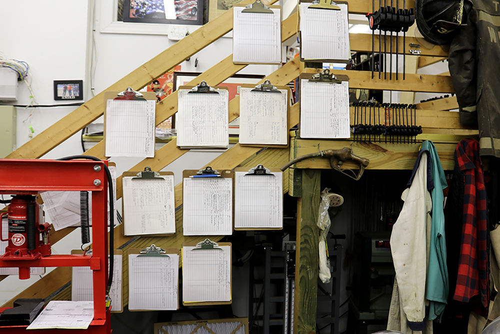 Ted meticulously records every change he makes to each of his 12 cars on these designated clipboards, which he described on Tuesday, Sept. 21, 2017, in Crownsville, Maryland. (Jess Feldman/Capital News Service)