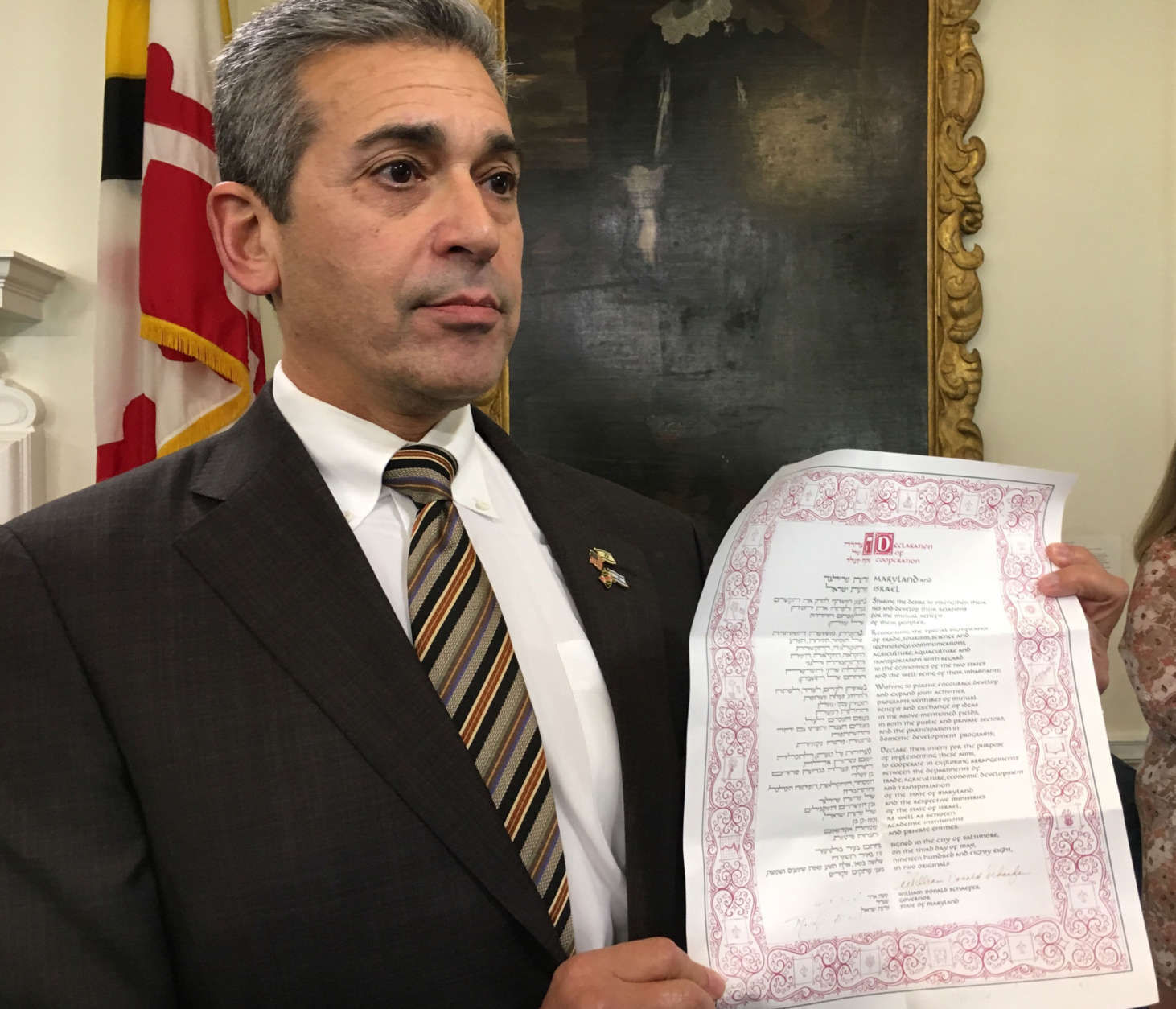 Del. Ben Kramer with a copy of the 1988 Declaration of Cooperation between Israel and Maryland. (WTOP/Kate Ryan)