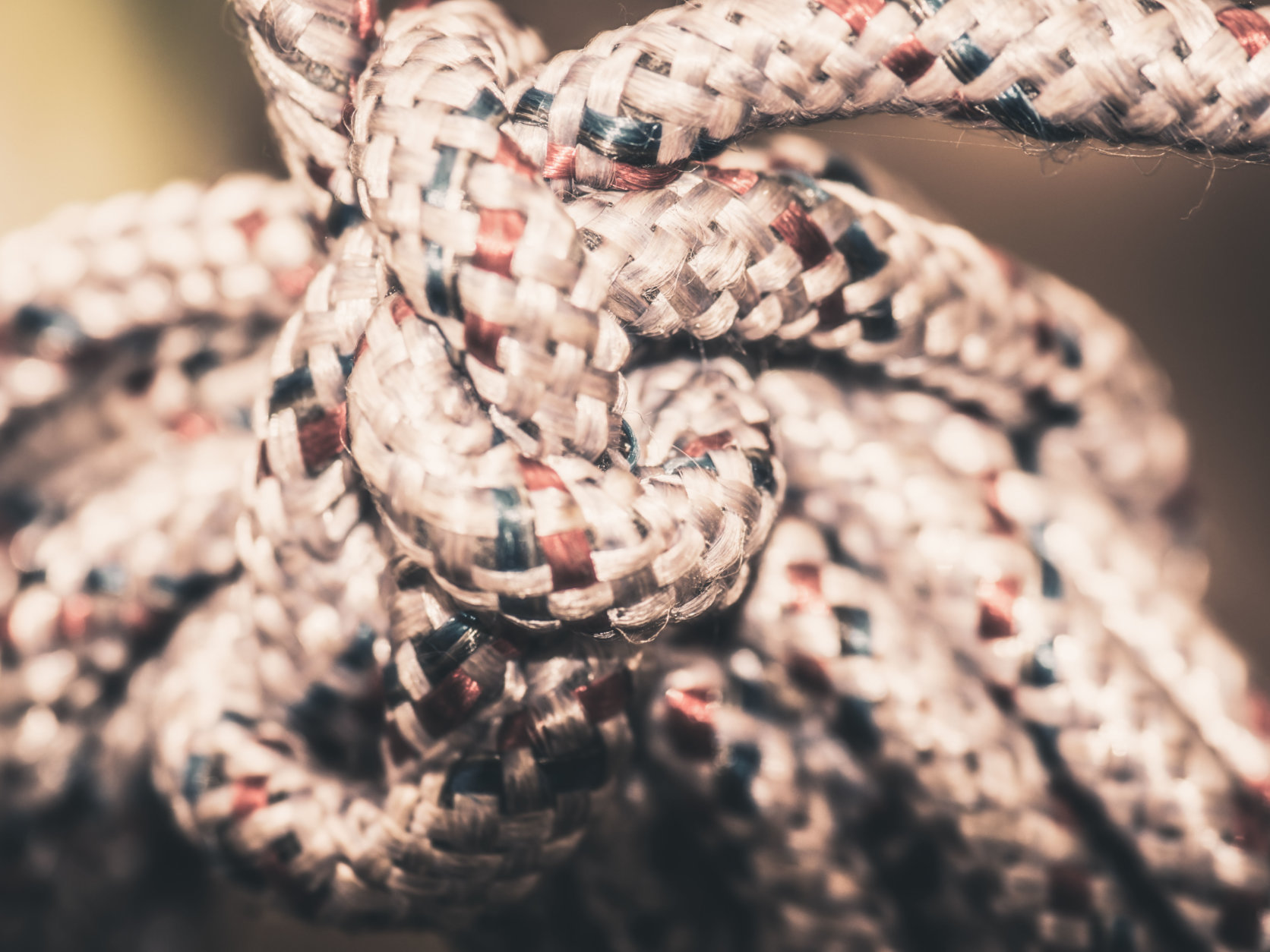 Close-up End of vintage rope on sunlight background.The concept of team works.
