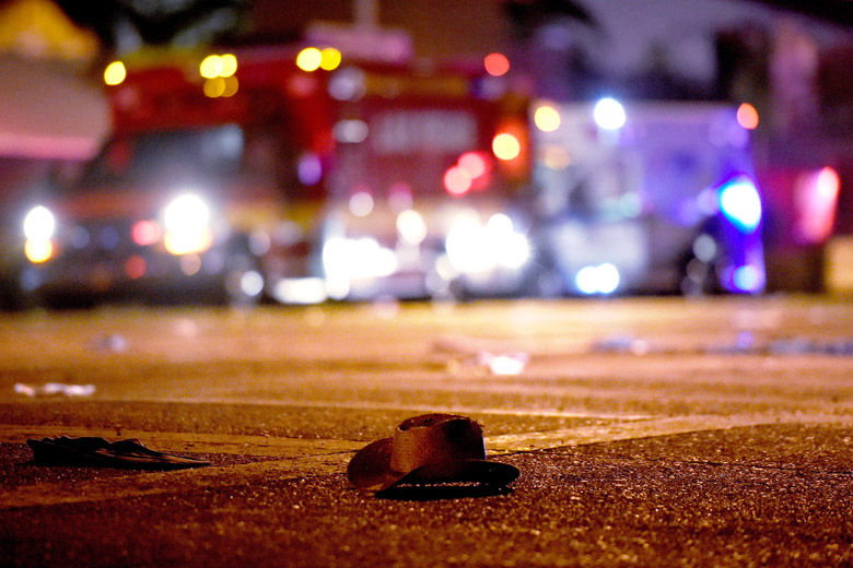 LAS VEGAS, NV - OCTOBER 02:  A cowboy hat lays in the street after shots were fired near a country music festival on October 1, 2017 in Las Vegas, Nevada. A gunman has opened fire on a music festival in Las Vegas, leaving at least 20 people dead and more than 100 injured. Police have confirmed that one suspect has been shot. The investigation is ongoing. (Photo by David Becker/Getty Images)