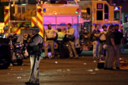 LAS VEGAS, NV - OCTOBER 02:  A Las Vegas Metropolitan Police Department officer stands in the intersection of Las Vegas Boulevard and Tropicana Ave. after a mass shooting at a country music festival nearby on October 2, 2017 in Las Vegas, Nevada. A gunman has opened fire on a music festival in Las Vegas, leaving at least 20 people dead and more than 100 injured. Police have confirmed that one suspect has been shot. The investigation is ongoing. (Photo by Ethan Miller/Getty Images)