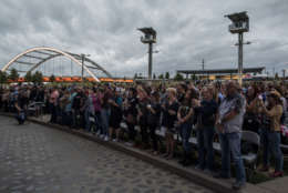 NASHVILLE, TN - OCTOBER 02: People gather at the Ascend Amphitheater for a vigil honoring the victims of the mass shooting in Las Vegas on October 2, 2017 in Nashville, Tennessee. At least 58 people were killed and 500 wounded at the Route 91 Harvest Festival in Las Vegas Sunday night. (Photo by Joe Buglewicz/Getty Images)
