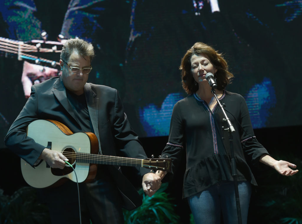 NASHVILLE, TN - OCTOBER 02:  Singer/Songwriter Vince Gill performs "Go Rest High on the Mountain" during Nashville Candelight Vigil For Las Vegas at Ascend Amphitheater on October 2, 2017 in Nashville, Tennessee.  Late Sunday night, a lone gunman, Stephan Paddock, 64, of Mesquite, Nevada, opened fire on attendees at the Route 91 Harvest Festival, a three-day country music festival, leaving at least 59 dead and over 500 injured before killing himself.  The massacre is one of the deadliest mass shooting events in U.S. history.  (Photo by Rick Diamond/Getty Images)