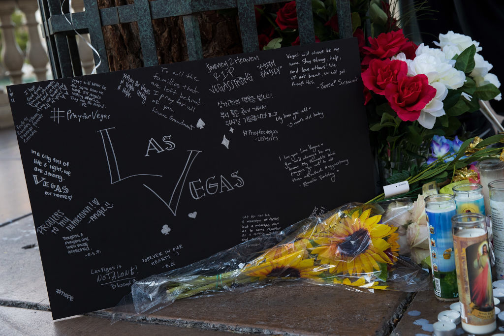 LAS VEGAS, NV - OCTOBER 3: A makeshift memorial for the victims of Sunday night's mass shooting, in front to the Bellagio, October 3, 2017 in Las Vegas, Nevada. Late Sunday night, a lone gunman killed over 50 people and injured over 500 people after he opened fire on a large crowd at the Route 91 Harvest Festival, a three-day country music festival. The massacre is one of the deadliest mass shooting events in U.S. history. (Photo by Drew Angerer/Getty Images)