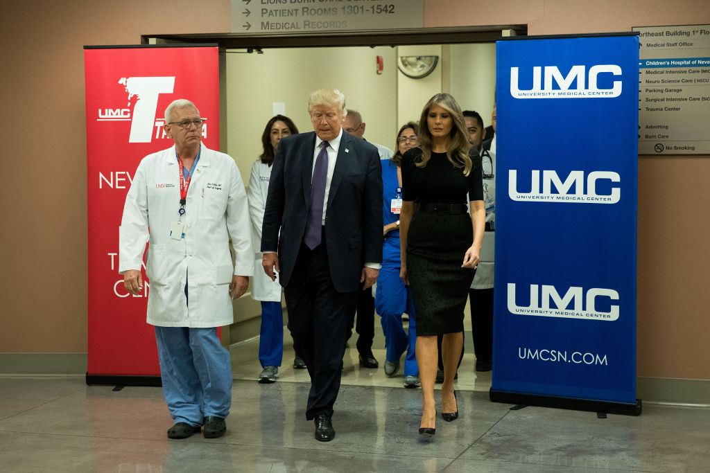 LAS VEGAS, NV - OCTOBER 4: (L-R) Surgeon Dr. John Fildes, President Donald Trump and first lady Melania Trump walk together at University Medical Center, October 4, 2017 in Las Vegas, Nevada. Trump is scheduled to visit with victims  and first responders from Sunday night's mass shooting during his trip to Las Vegas. (Photo by Drew Angerer/Getty Images)