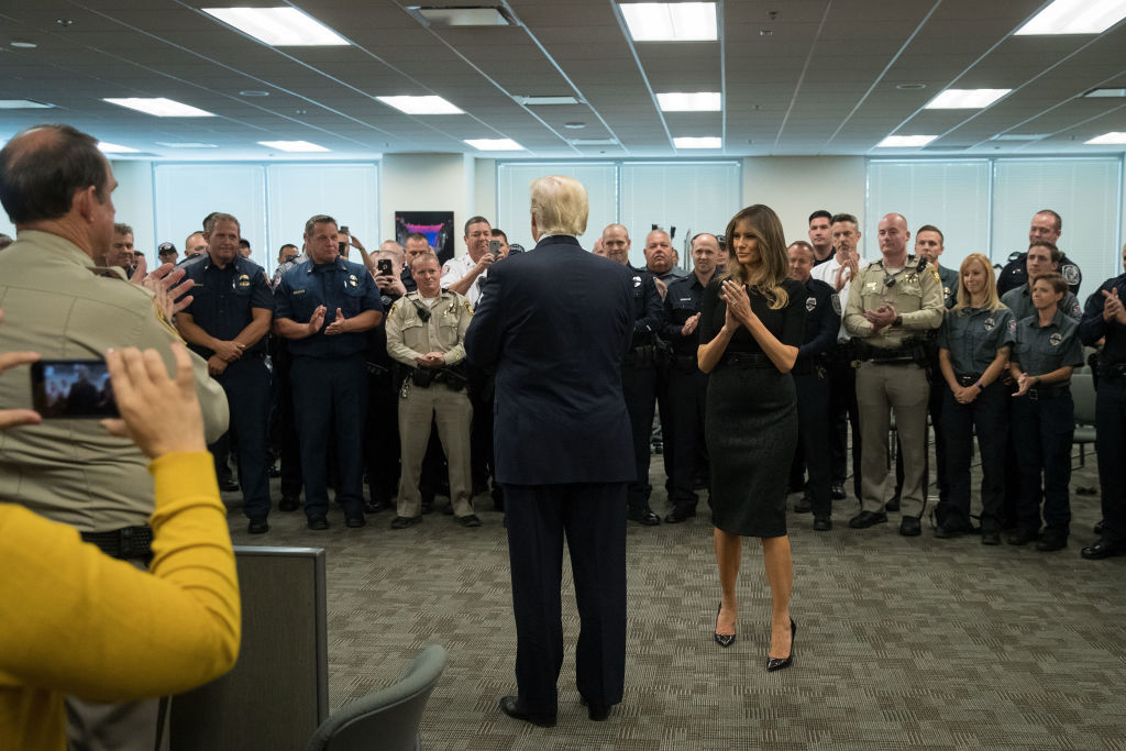 LAS VEGAS, NV - OCTOBER 4: President Donald Trump and first lady Melania Trump greet a room full of police officers and first responders at Las Vegas Metropolitan Police Department headquarters, October 4, 2017 in Las Vegas, Nevada. Trump is scheduled to visit with victims  and first responders from Sunday night's mass shooting during his trip to Las Vegas. (Photo by Drew Angerer/Getty Images)
