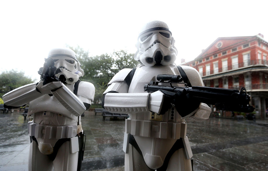 NEW ORLEANS, LA - OCTOBER 07:  A pair of Storm Troopers walk through Jackson Square in the French Quarter as feeder bands fom Hurricane Nate begin to come a shore on October 7, 2017 in New Orleans, Louisiana.  Nate is expected to make landfall as a category 2 hurricane near Biloxi, Mississippi later this evening.  (Photo by Sean Gardner/Getty Images)