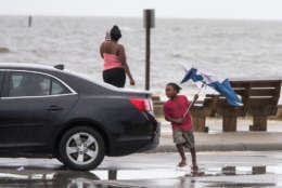 GULFPORT,MS-OCTOBER 7, 2017:  A family takes photos of the Gulf of Mexico in Gulfport, Mississippi as Hurricane Nate approaches the northern Mississippi Gulf Coast on October 7, 2017 in Gulfport, Mississippi.  Nate is expected to make landfall in the overnight hours as a category 2 storm.   (Photo by Mark Wallheiser/Getty Images)