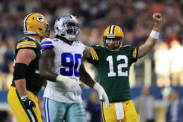 ARLINGTON, TX - OCTOBER 08:  Aaron Rodgers #12 of the Green Bay Packers reacts after throwing the game winning touchdown against the Dallas Cowboys in the fourth quarter at AT&amp;T Stadium on October 8, 2017 in Arlington, Texas.  (Photo by Ronald Martinez/Getty Images)