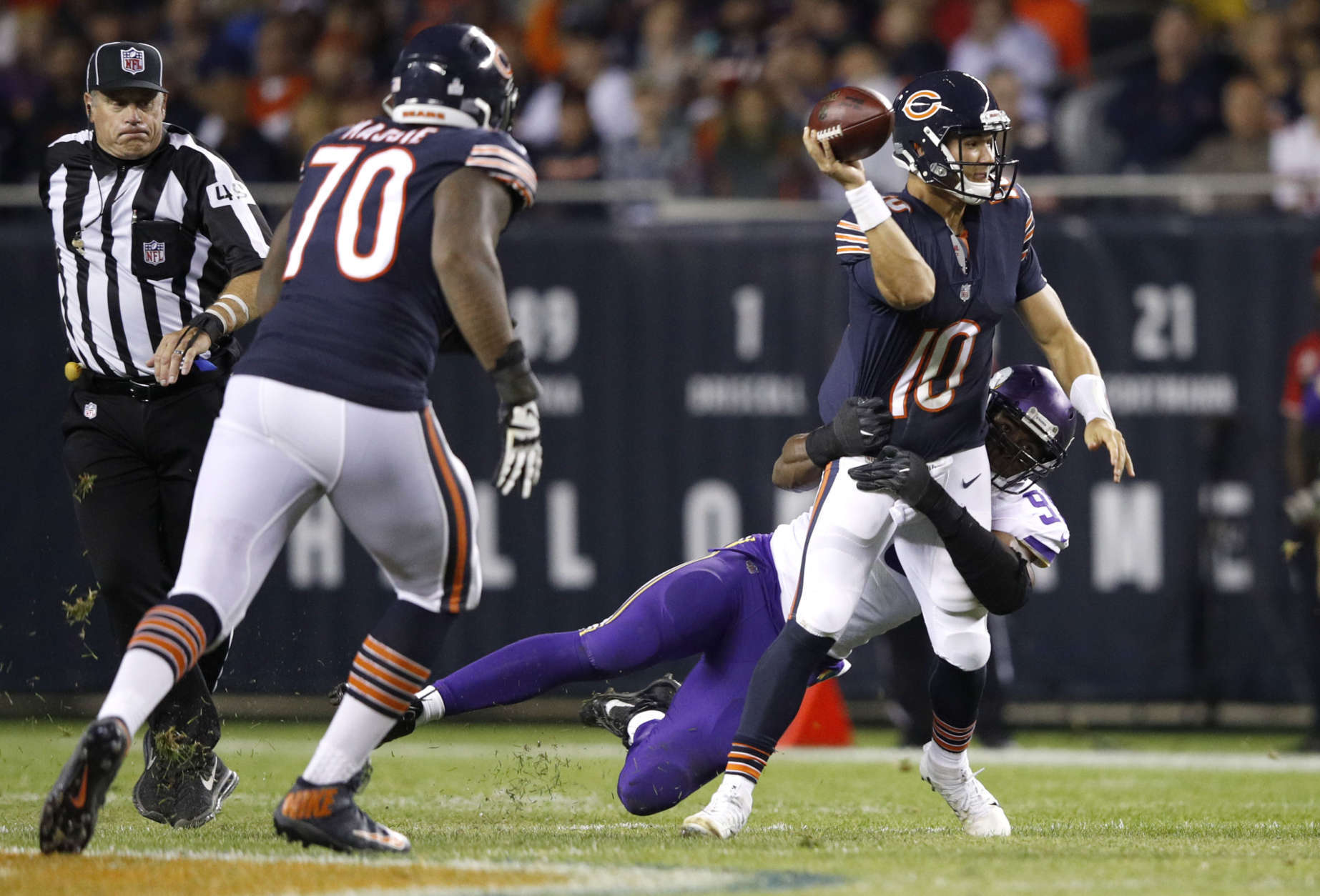 CHICAGO, IL - OCTOBER 09:  Quarterback Mitchell Trubisky #10 of the Chicago Bears is hit by  Danielle Hunter #99 of the Minnesota Vikings in the third quarter at Soldier Field on October 9, 2017 in Chicago, Illinois.  (Photo by Joe Robbins/Getty Images)
