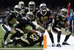 NEW ORLEANS, LA - OCTOBER 15: The New Orleans Saints defense celebrates during the second half of a game against the Detroit Lions at the Mercedes-Benz Superdome on October 15, 2017 in New Orleans, Louisiana.  (Photo by Jonathan Bachman/Getty Images)