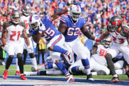 ORCHARD PARK, NY - OCTOBER 22:  LeSean McCoy #25 of the Buffalo Bills scores a touchdown during the second quarter of an NFL game against the Tampa Bay Buccaneers on October 22, 2017 at New Era Field in Orchard Park, New York.  (Photo by Brett Carlsen/Getty Images)