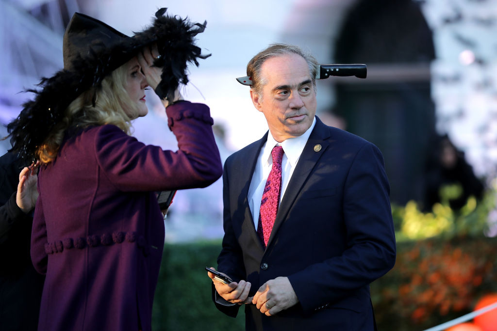 WASHINGTON, DC - OCTOBER 30:  U.S. Secretary of Veterans Affairs David Shulkin (R) attends Halloween at the White House on the South Lawn October 30, 2017 in Washington, DC. President Donald Trump and first lady Melania Trump gave cookies away to costumed trick-or-treaters one day before the Halloween holiday.  (Photo by Chip Somodevilla/Getty Images)