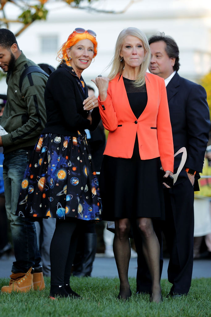 WASHINGTON, DC - OCTOBER 30:  U.S. Education Secretary Betsy DeVos (L), who was dressed as Ms. Frizzle from 'The Magic Schoolbus' series, and Counselor to the President Kellyanne Conway attend Halloween at the White House on the South Lawn October 30, 2017 in Washington, DC. President Donald Trump and first lady Melania Trump gave cookies away to costumed trick-or-treaters one day before the Halloween holiday.  (Photo by Chip Somodevilla/Getty Images)