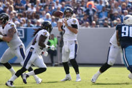 NASHVILLE, TN - NOVEMBER 05:  Joe Flacco #5 of the Baltimore Ravens throws a pass against the Tennessee Titans during the first quarter at Nissan Stadium on November 5, 2017 in Nashville, Tennessee.  (Photo by Frederick Breedon/Getty Images)