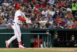 WASHINGTON, DC - AUGUST 07:  Bryce Harper #34 of the Washington Nationals follows his solo home run for his 150th career homer in the fourth inning against the Miami Marlins at Nationals Park on August 7, 2017 in Washington, DC.  (Photo by Rob Carr/Getty Images)