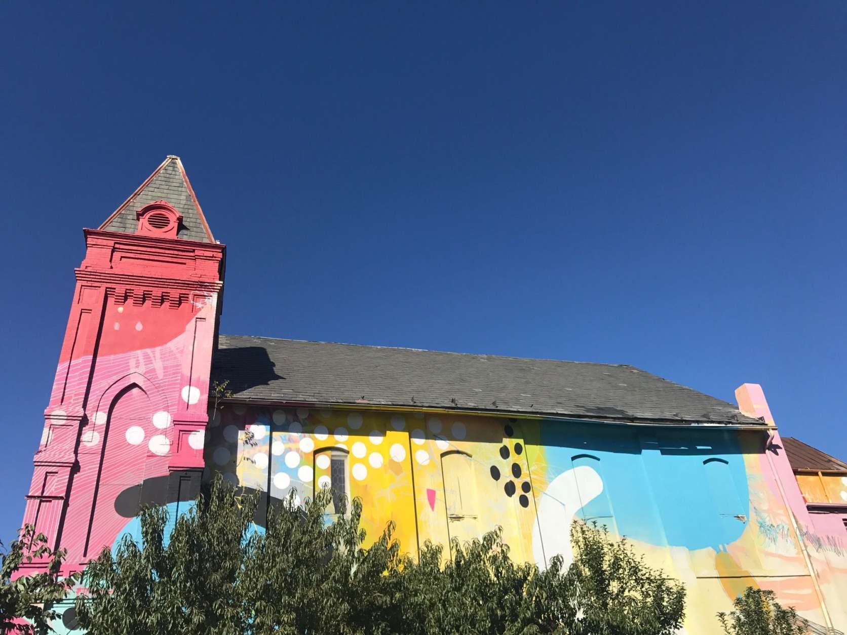 Blind Whino is an old church-turned-arts-space, just a few blocks from Nationals Park. Now through Nov. 4, it is the home to Superfierce, an exhibit and series of events highlighting female artists. (WTOP/Rachel Nania) 
