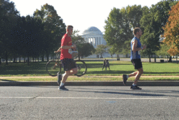 Runners jog past the Jefferson Memorial during the Marine Corps Marathon. (Courtesy Cody House)