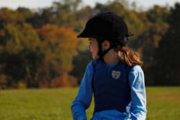 It’s all about the fun. 11year old Addie Steffes has a laugh during a lesson at Olney Farm. (WTOP/Kate Ryan)